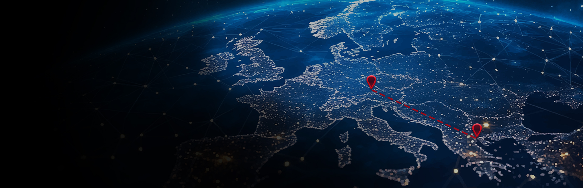 Satellite image of Europe at night with two red markers and a dashed line connecting Landau an der Isar and Thessaloniki.