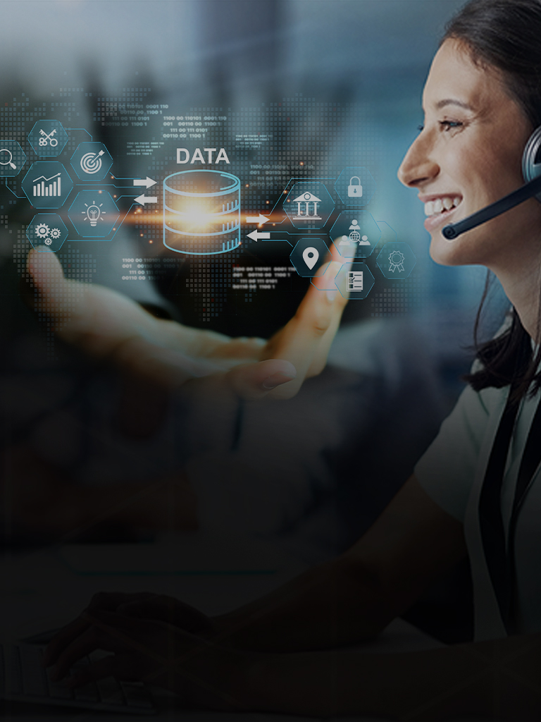 Woman wearing a headset in front of a digital background with icons and the word “DATA”. An open hand is visible in front.